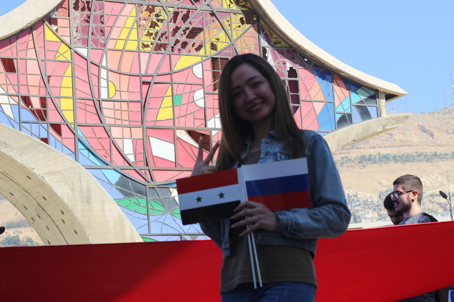 الجالية الروسية تحتفل بـ عيد العلم في ساحة الأمويين بدمشق - سبوتنيك عربي, 1920, 22.08.2023