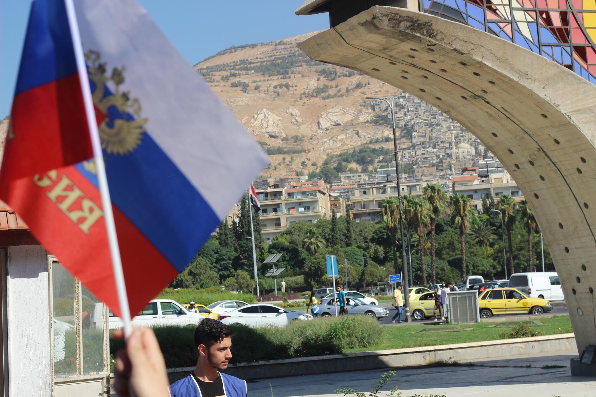 الجالية الروسية تحتفل بـ عيد العلم في ساحة الأمويين بدمشق - سبوتنيك عربي, 1920, 22.08.2023