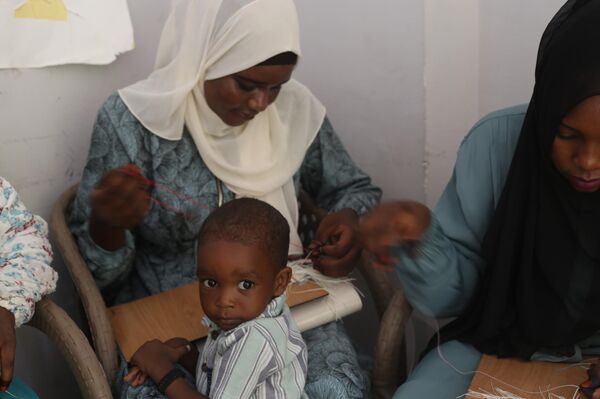 لاجئات سودانيات في مصر مصر يتدربن على المشغولات اليدوية لإعالة أسرهن - سبوتنيك عربي