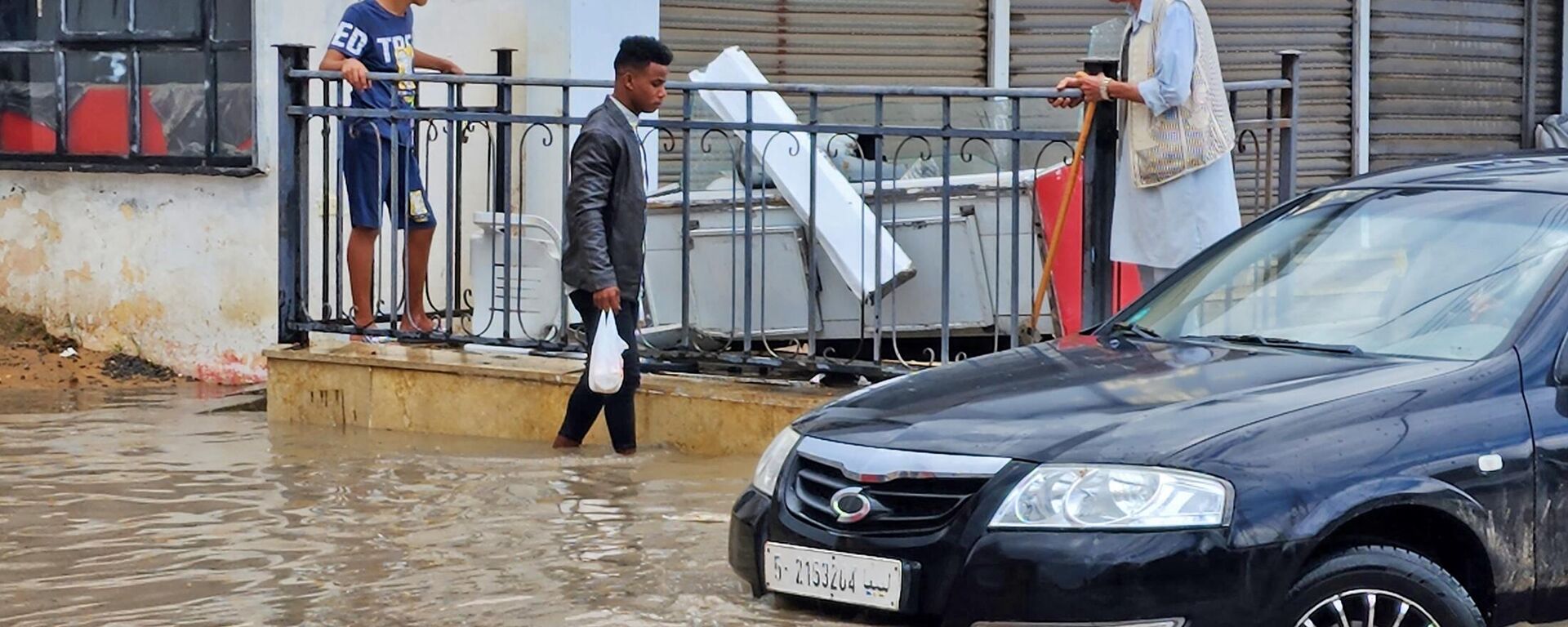 سيارات تمر عبر مياه الفيضانات بعد هطول أمطار غزيرة في العاصمة الليبية طرابلس، 19 أكتوبر/ تشرين الأول 2022 سيارات تمر عبر مياه الفيضانات بعد هطول أمطار غزيرة في العاصمة الليبية طرابلس، 19 أكتوبر/ تشرين الأول 2022 - سبوتنيك عربي, 1920, 12.09.2023