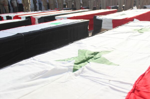 تشييع ضحايا الهجوم الإرهابي على حفل تخريج &quot;الكلية الحربية&quot; بمحافظة حمص - سبوتنيك عربي