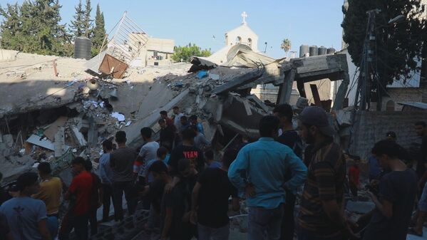 مقتل 16 مسيحيا فلسطينيا في قصف كنيسة الروم الأرثودكس بغزة  - سبوتنيك عربي