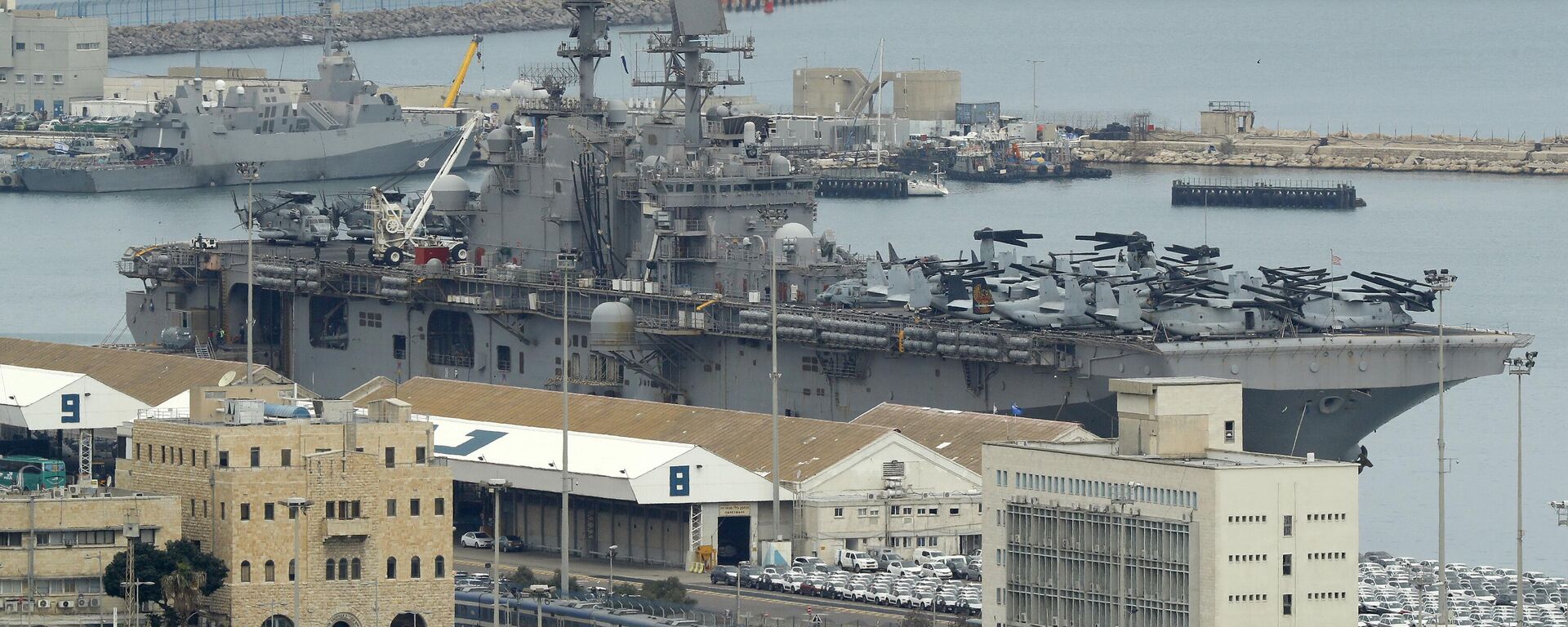 السفينة الهجومية الأمريكية يو إس إس إيو جيما راسية في ميناء حيفا شمال إسرائيل في 15 مارس 2018 - سبوتنيك عربي, 1920, 06.06.2024