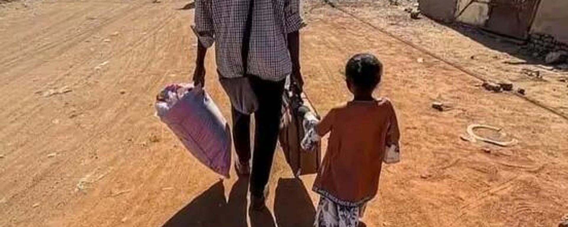 معاناة شديدة يعيشها آلاف السودانيين بعد استيلاء قوات الدعم السريع على مدينة ود مدني بولاية الجزيرة - سبوتنيك عربي, 1920, 02.03.2025