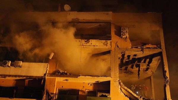 المبنى الذي كان يتواجد فيه القيادي في حركة حماس صالح العاروري في الضاحية الجنوبية لبيروت وقتل فيه هو وقيادات من حماس إثر قصف إسرائيلي - سبوتنيك عربي