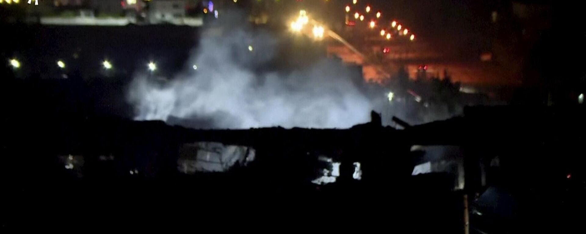 دخان يتصاعد من مبنى بعد الهجوم الصاروخي الذي شنه الحرس الثوري الإيراني على عاصمة إقليم كردستان العراق أربيل، في 16 يناير 2024.
 - سبوتنيك عربي, 1920, 14.04.2024