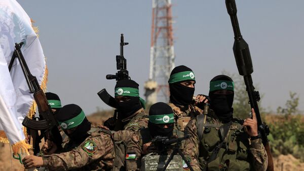 عناصر من كتائب القسام، الجناح المسلح لحركة حماس - سبوتنيك عربي