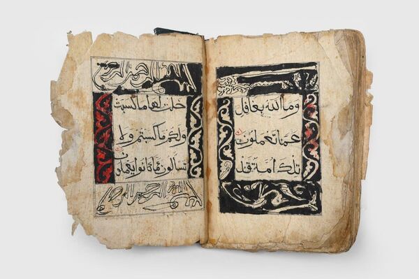 نسخة صينية نادرة من القرآن معروضة في معرض أبو ظبي للكتاب - سبوتنيك عربي