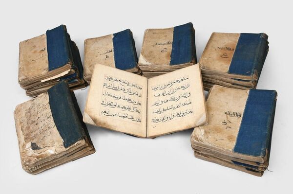 نسخة صينية نادرة من القرآن معروضة في معرض أبو ظبي للكتاب - سبوتنيك عربي