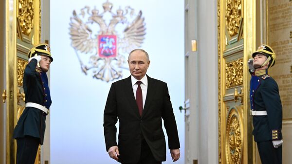 الرئيس الروسي المنتخب فلاديمير بوتين خلال حفل تنصيبه في الكرملين. - سبوتنيك عربي