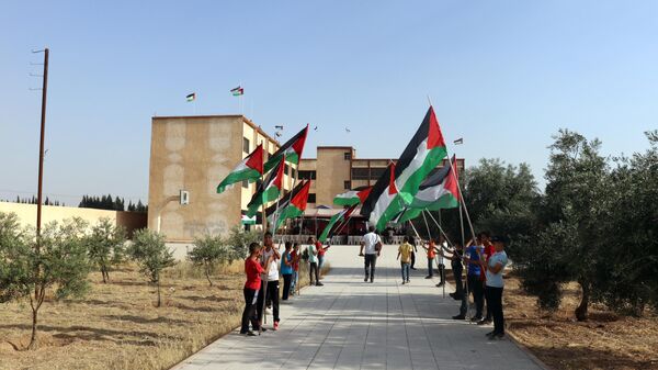 خلال تكريم  لمقاتلي حركة الجهاد الإسلامي في فلسطين الساحة السورية ممن ارتقوا خلال الأشهر الماضية ضمن معركة طوفان الأقصى في جنوب لبنان. - سبوتنيك عربي