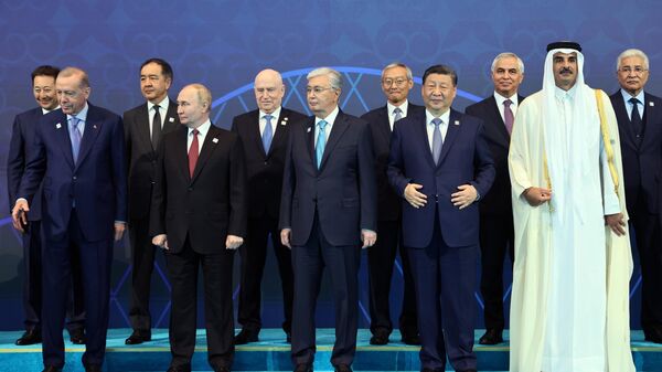 الرئيس الروسي فلاديمير بوتين في صورة مشتركة لرؤساء وفود الدول الأعضاء في منظمة شنغهاي للتعاون - سبوتنيك عربي