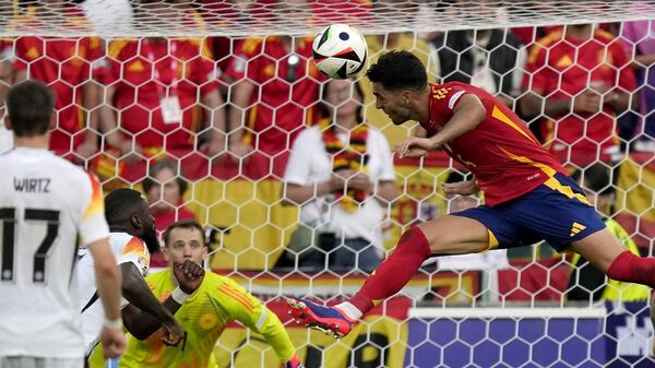 Spain's Mikel Merino scores his side's second goal during a quarter final match between Germany and Spain at the Euro 2024 soccer tournament in Stuttgart, Germany, Friday, July 5, 2024. (AP Photo/Ariel Schalit) - سبوتنيك عربي