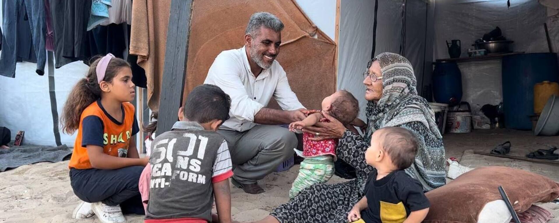 مدينة الأيتام... مخيم نزوح يحتضن أيتام حرب قطاع غزة في خان يونس - سبوتنيك عربي, 1920, 21.07.2025