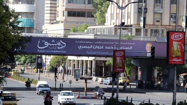الماكينة الانتخابية تحتدم في شوارع دمشق مع اقتراب موعد الاستحقاق البرلماني - سبوتنيك عربي