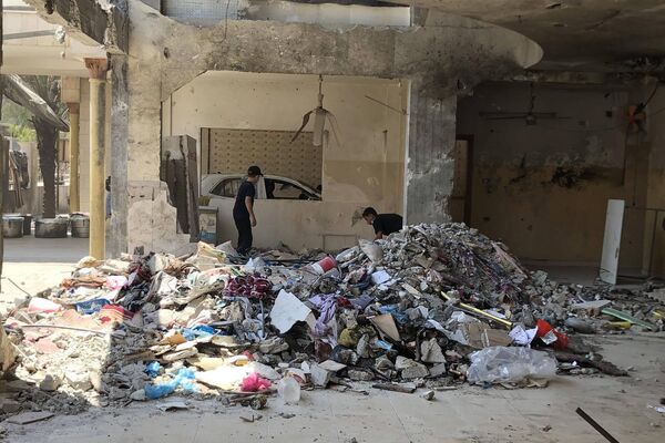 صورة من مجزرة مدرسة &quot;التابعين&quot; الشرعية في حي &quot;الدرج&quot; في مدينة غزة، التي قصفها الجيش الإسرائيلي - سبوتنيك عربي