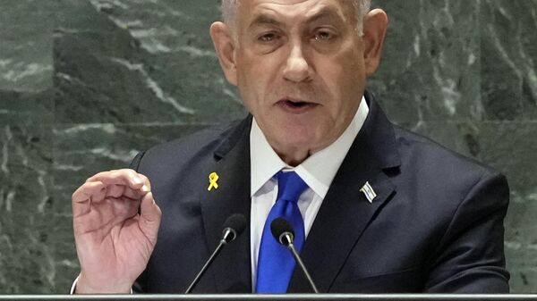 Israel Prime Minister Benjamin Netanyahu addresses the 79th session of the United Nations General Assembly, Friday, Sept. 27, 2024. (AP Photo/Richard Drew)


 - سبوتنيك عربي