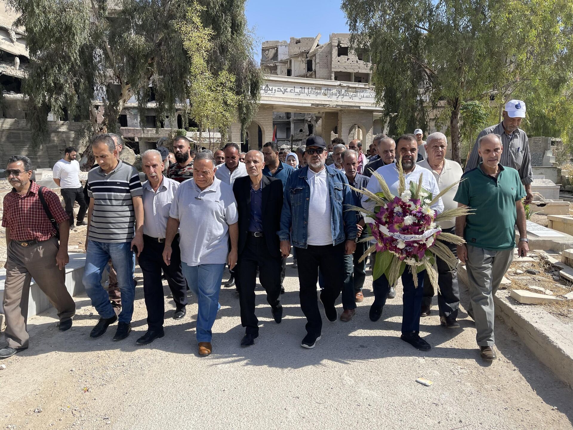 فلسطينيو دمشق يحيون ذكرى طوفان الأقصى بزيارة مقبرة الشهداء في مخيم اليرموك - سبوتنيك عربي, 1920, 08.10.2024