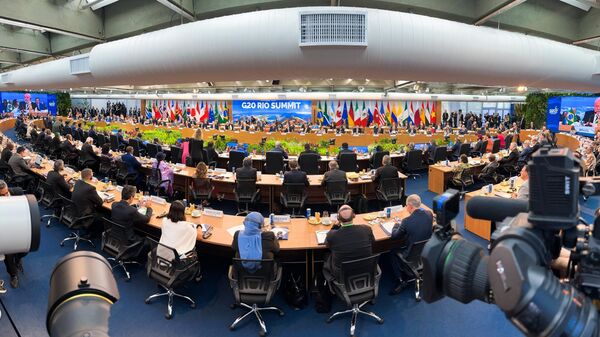 المشاركون في حفل إطلاق التحالف العالمي لمكافحة الجوع والفقر ضمن قمة قادة مجموعة العشرين في ريو دي جانيرو. المشاركون في حفل إطلاق التحالف العالمي لمكافحة الجوع والفقر ضمن قمة قادة مجموعة العشرين في ريو دي جانيرو. - سبوتنيك عربي