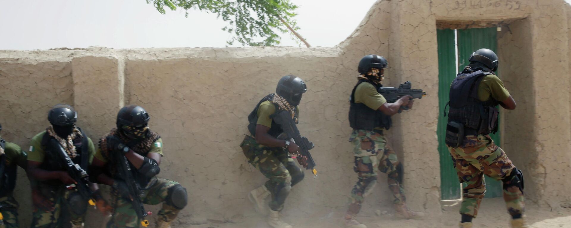 Nigerian special forces participate in an hostage rescue exercise at the end of the Flintlock exercise in Mao, Chad, Saturday, March 7, 2015. The U.S. military and its Western partners conduct this training annually and set up plans long before Boko Haram began attacking its neighbors Niger, Chad and Cameroon - سبوتنيك عربي, 1920, 08.01.2025