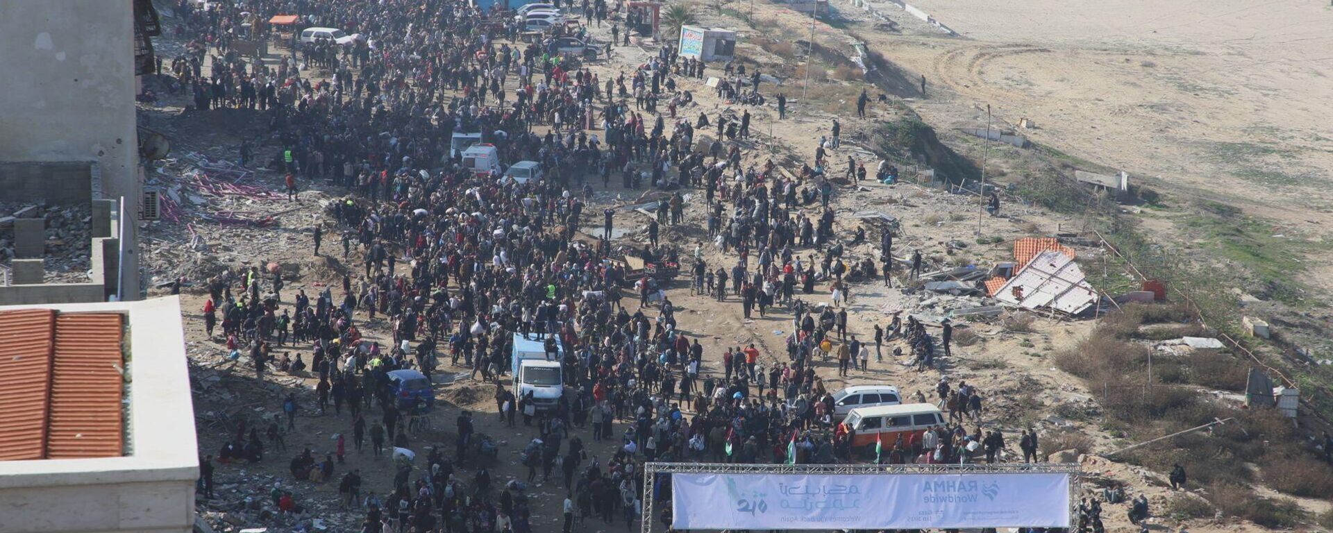 آلاف الفلسطينيين النازحين يعودون إلى شمال قطاع غزة - سبوتنيك عربي, 1920, 21.03.2025