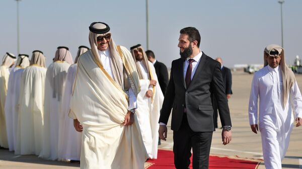 أمير دولة قطر تميم بن حمد آل ثاني وأحمد الشرع  - سبوتنيك عربي