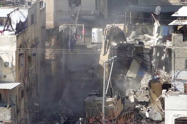 صورلعشرات المنازل والمحال التجارية المدمرة بمخيم طولكرم شمال الضفة الغربية صورلعشرات المنازل والمحال التجارية المدمرة بمخيم طولكرم شمال الضفة الغربية - سبوتنيك عربي