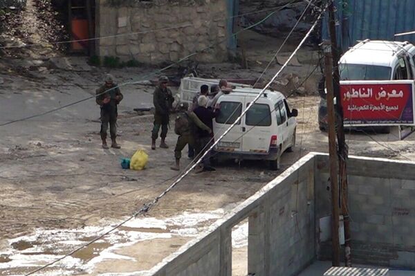 صورلعشرات المنازل والمحال التجارية المدمرة بمخيم طولكرم شمال الضفة الغربية صورلعشرات المنازل والمحال التجارية المدمرة بمخيم طولكرم شمال الضفة الغربية - سبوتنيك عربي