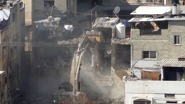 صورلعشرات المنازل والمحال التجارية المدمرة بمخيم طولكرم شمال الضفة الغربية - سبوتنيك عربي