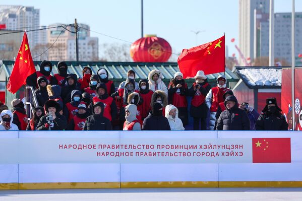 متفرجون صينيون في مهرجان الرياضات الشتوية الروسي الصيني في بلاغوفيشتشينسك. متفرجون صينيون في مهرجان الرياضات الشتوية الروسي الصيني في بلاغوفيشتشينسك. - سبوتنيك عربي