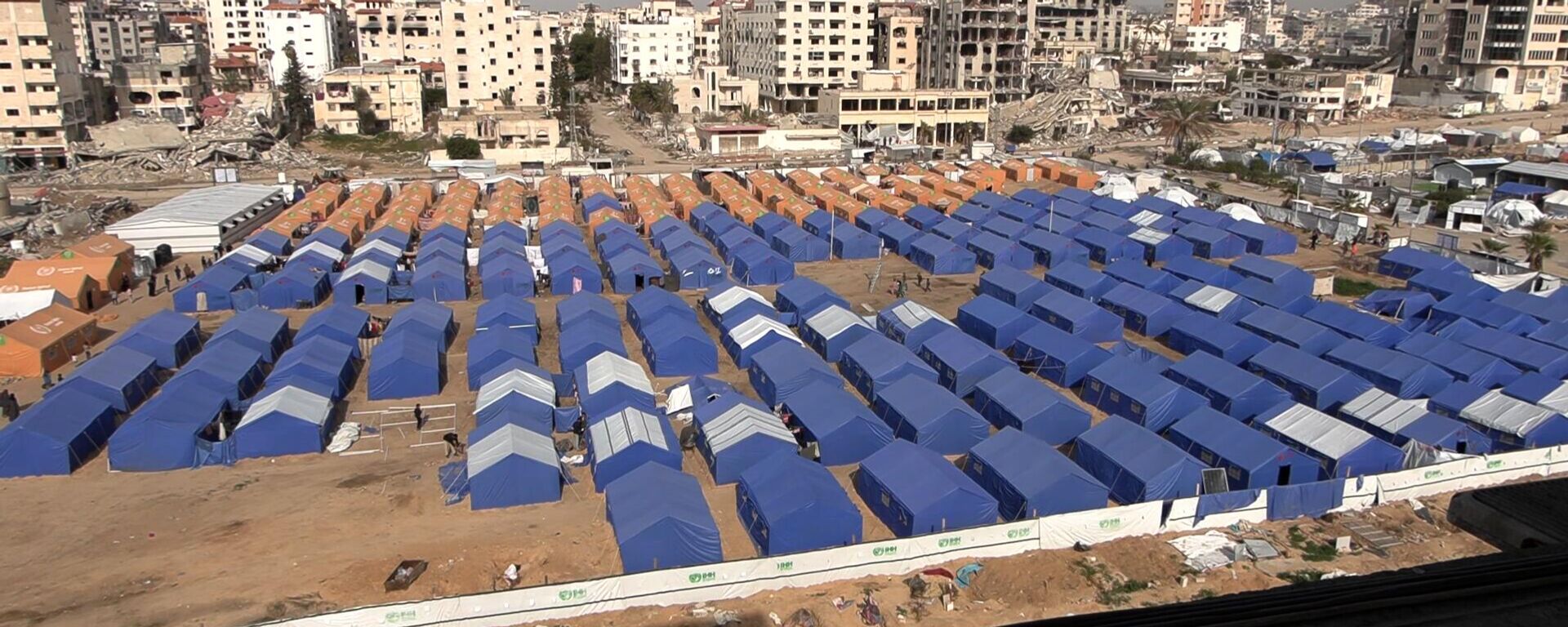 من الخيمة إلى الخيمة... أول مخيم إيواء في غزة يحتضن عائدين من جنوبي القطاع - سبوتنيك عربي, 1920, 25.02.2025