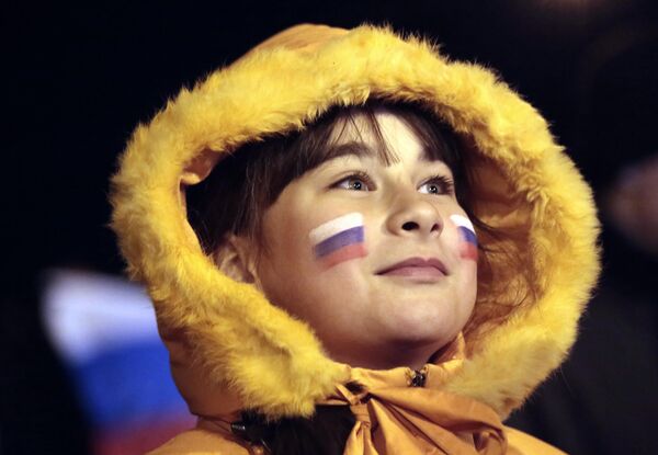 سكان سيمفيروبول في حفل ربيع القرم الذي يقام في ساحة لينين وسط المدينة، في انتظار إعلان نتائج الاستفتاء على وضع شبه جزيرة القرم. - سبوتنيك عربي