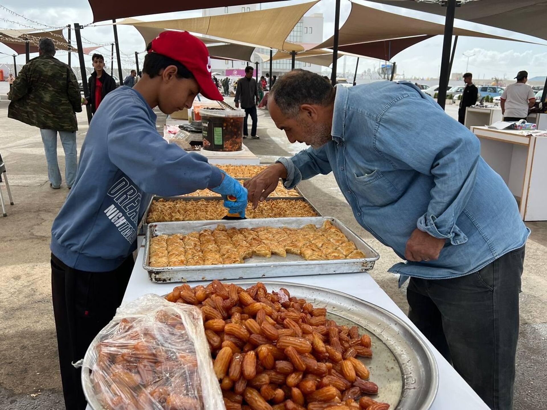 سوق الحوت في بنغازي.. أجواء رمضانية تعكس روح التراث والتقاليد - سبوتنيك عربي, 1920, 27.03.2025