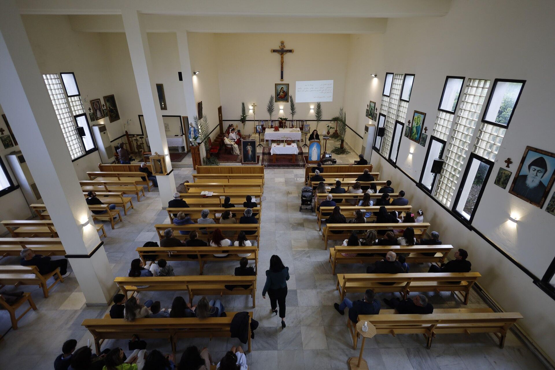 رغم مشاهد الدمار التي خلفتها الحرب في جنوب لبنان.. إحياء أحد الشعانين ببلدة علما الشعب رغم مشاهد الدمار التي خلفتها الحرب في جنوب لبنان.. إحياء أحد الشعانين ببلدة علما الشعب - سبوتنيك عربي, 1920, 13.04.2025