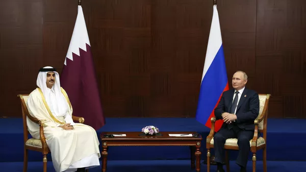 أمير قطر الشيخ تميم بن حمد آل ثاني مع الرئيس الروسي فلاديمير بوتين - سبوتنيك عربي