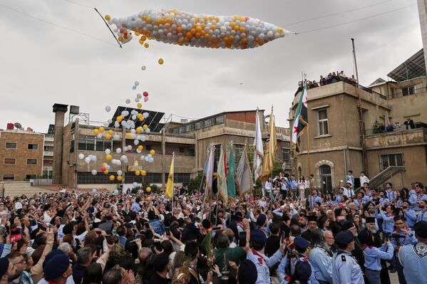 أعضاء الكنيسة الأرثوذكسية اليونانية يحتفلون بأحد الشعانين في دمشق، سوريا - سبوتنيك عربي