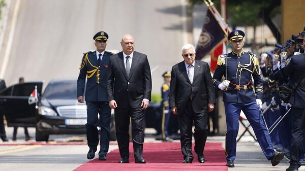 الرئيس اللبناني جوزيف عون والرئيس الفلسطيني محمود عباس  - سبوتنيك عربي