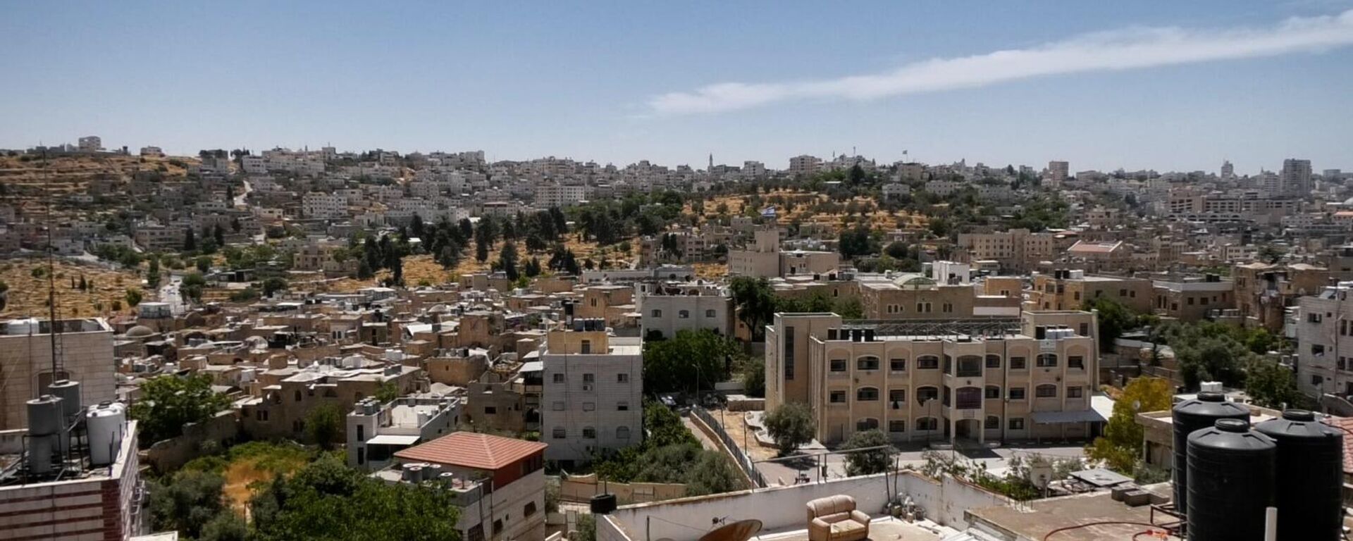 إسرائيل تشدد حصارها على الخليل جنوبي الضفة الغربية والقيود تطال دفن الموتى - سبوتنيك عربي, 1920, 24.05.2025