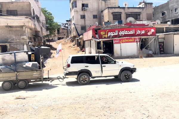 فلسطينيون يشاهدون هدم بيوتهم في طولكرم  - سبوتنيك عربي