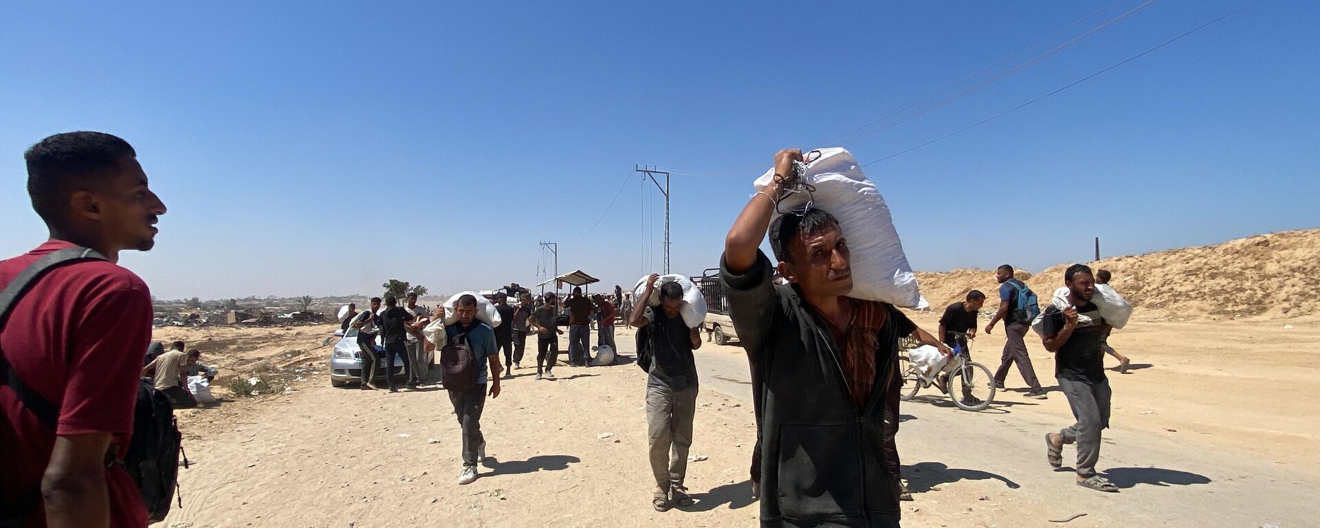 مراكز المساعدات في غزة... مصائد موت أثناء الحصول على بعض الطعام - سبوتنيك عربي, 1920, 24.06.2025