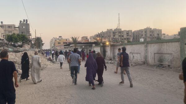 الحصول على كيس الطحين في قطاع غزة مخاطرة يدفعها الجوع قد تنتهي بالموت - سبوتنيك عربي