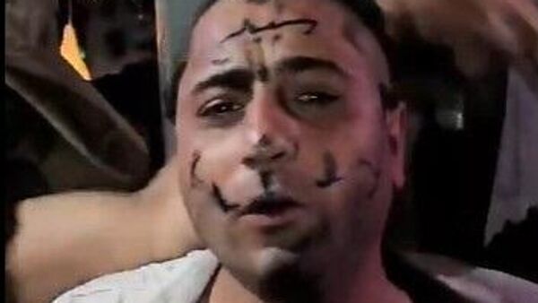 صورة من فيديو للاعتداء على فنان سوري انتشر على وسائل التواصل الاجتماعي - سبوتنيك عربي