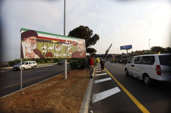 المئات من مناصري &quot;حزب الله&quot; يخرجون لاستقبال أمين المجلس الأعلى للأمن القومي الإيراني علي لاريجاني في بيروت. - سبوتنيك عربي