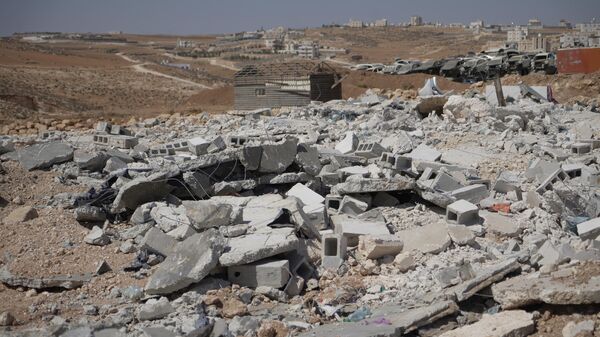 هدم المنشآت الفلسطينية جنوبي الضفة الغربية يحرم مئات الأسر من مصدر رزقها - سبوتنيك عربي