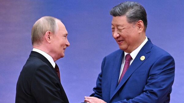 الرئيس الروسي فلاديمير بوتين، ورئيس جمهورية الصين الشعبية شي جين بينغ - سبوتنيك عربي