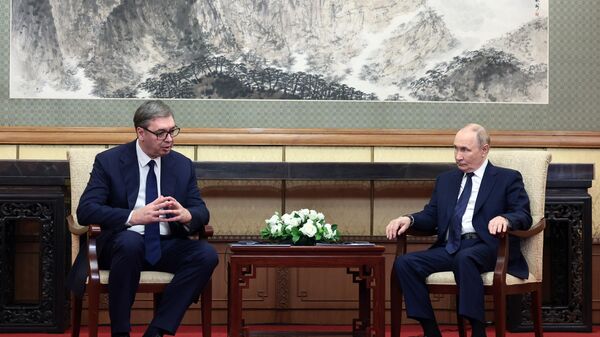  الرئيس الروسي فلاديمير بوتين خلال اجتماعه مع الرئيس الصربي ألكسندر فوتشيتش. - سبوتنيك عربي