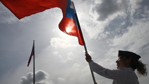 علم روسيا في يوم العلم الوطني لروسيا علم روسيا في يوم العلم الوطني لروسيا - سبوتنيك عربي