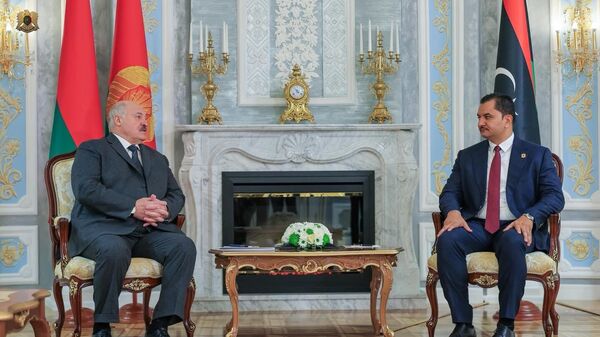 نائب القائد العام للقوات المسلحة العربية الليبية الفريق أول ركن صدام حفتر مع رئيس جمهورية بيلاروسيا ألكسندر لوكاشينكو - سبوتنيك عربي