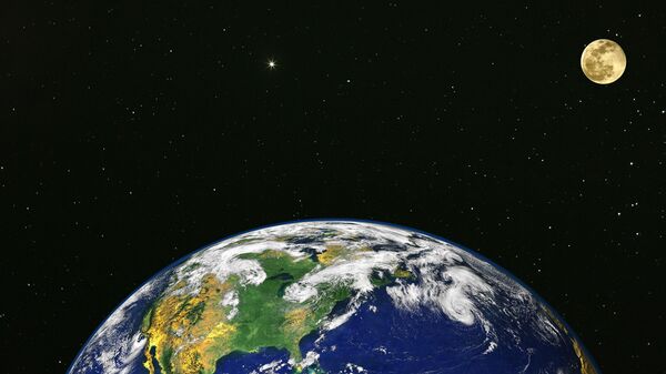 الأرض والقمر - سبوتنيك عربي
