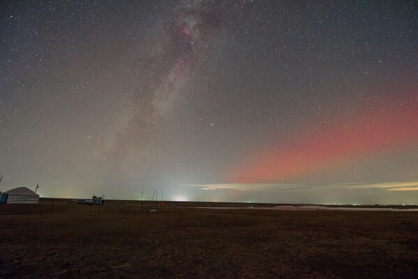 أضواء الشفق القطبي تضيء سماء داتشينغ،  الصينية. - سبوتنيك عربي